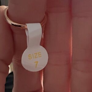 Gold Ring with White Tag